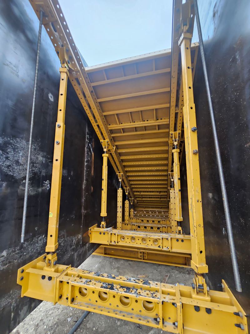 Bridge deck rebar mat with concrete pump truck on a TxDOT jobsite